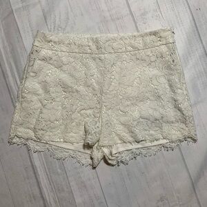 Express cream colored lace shorts. Size 4.